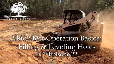 how to level dirt with a skid steer|skid steer hole filling.